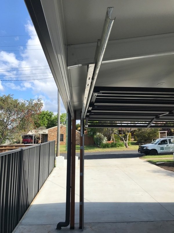 after Black Powder-coated Steel Custom Door – Shaddock Bar Grille Door, Centenary Heights