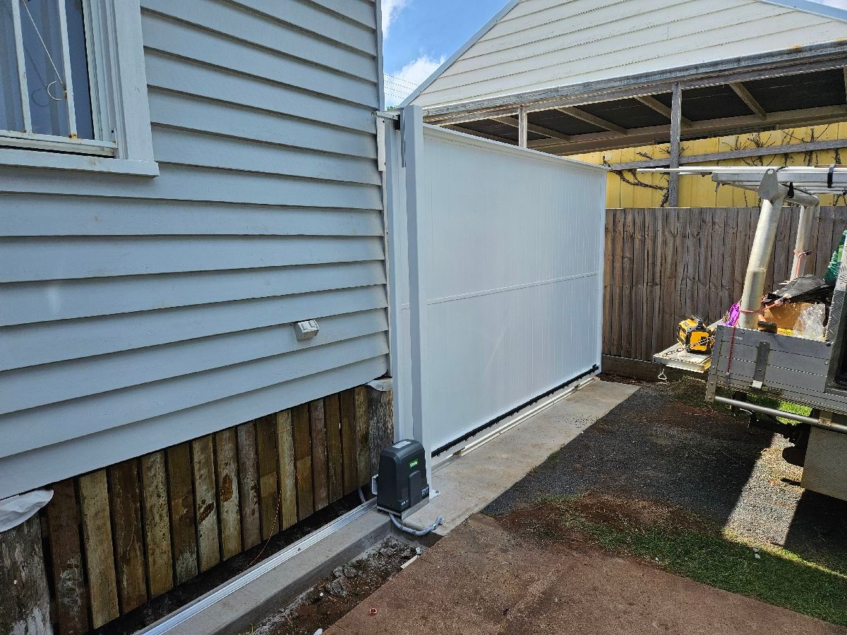 after Powder Coated White Powder-coated Aluminium Sliding Gate – Aluminium Sliding Gates + Motors, East Toowoomba