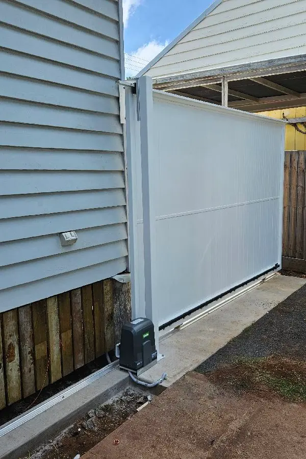 after Powder Coated White Powder-coated Aluminium Sliding Gate – Aluminium Sliding Gates + Motors, East Toowoomba
