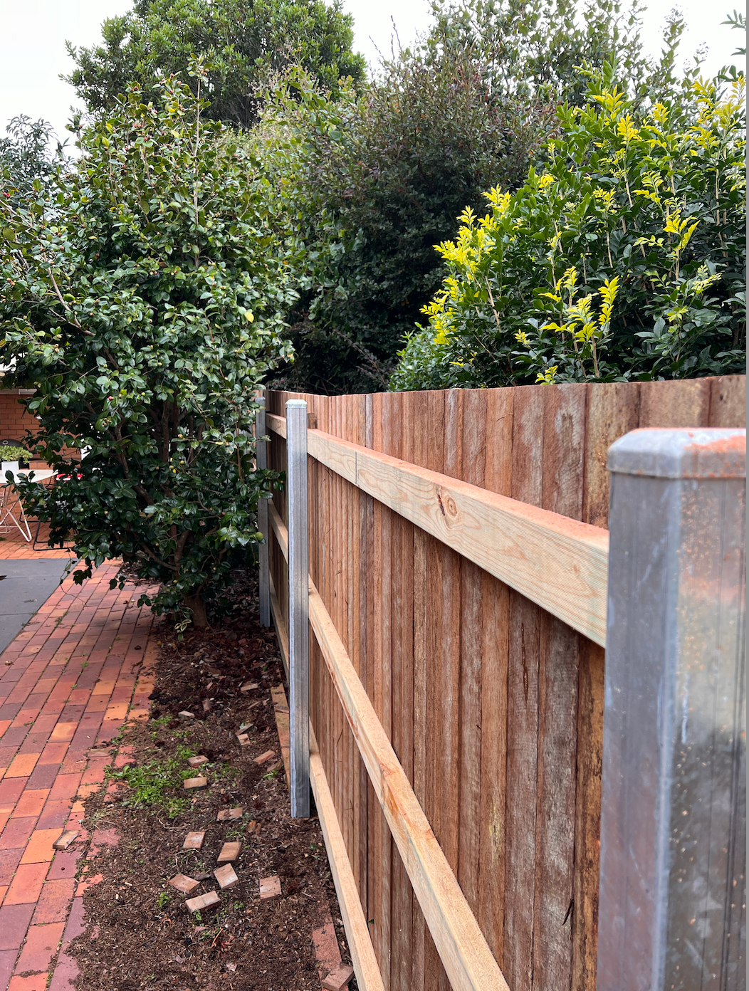 after Wood-look Timber + Galvanised Steel Posts Custom Door – Side Fencing, Rangeville