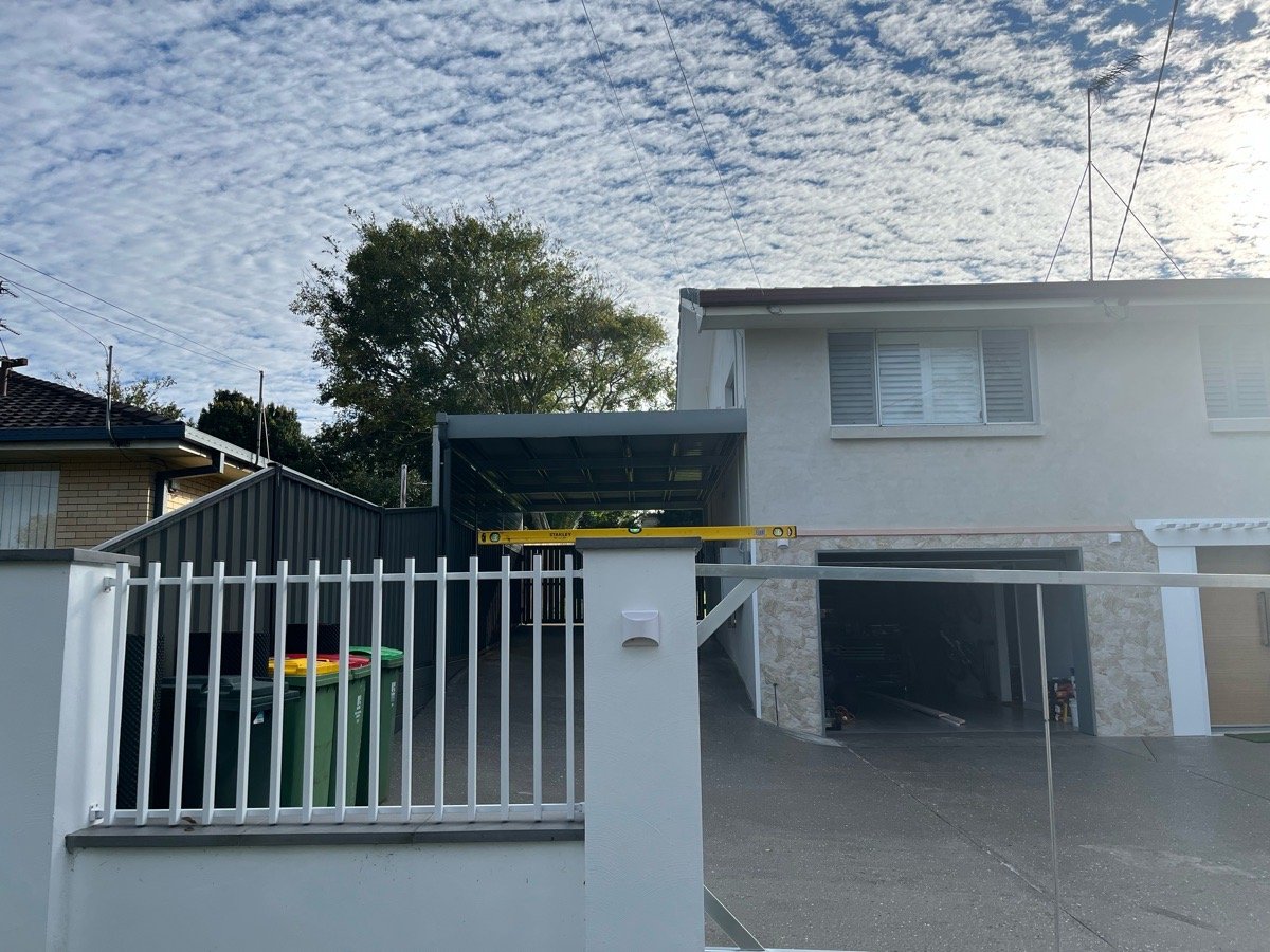 after Pro Texture White Powder-coated Aluminium Sliding Gate – Service Job - Slide Gate & Motor, Centenary Heights