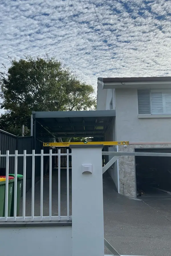 after Pro Texture White Powder-coated Aluminium Sliding Gate – Service Job - Slide Gate & Motor, Centenary Heights