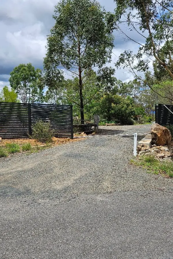 after Monument Colorbond Steel Sliding Gate – Slide Gate + Motor (Monument 1800x5000 Horizontal Slat + Infill Panels + LV Motor + Steel Return), Cabarlah