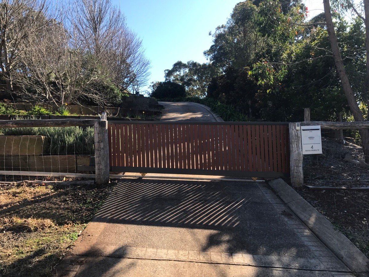 after Wood-look Powder-coated Aluminium Sliding Gate – Repairs to Gate (Single Sliding Aluminium Vertical Slat + Centsys Motor LV PSU swap), Blue Mountain Heights
