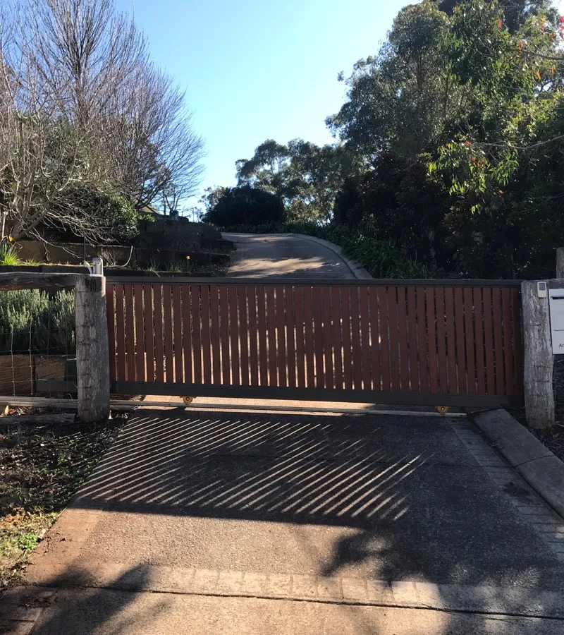 after Wood-look Powder-coated Aluminium Sliding Gate – Repairs to Gate (Single Sliding Aluminium Vertical Slat + Centsys Motor LV PSU swap), Blue Mountain Heights