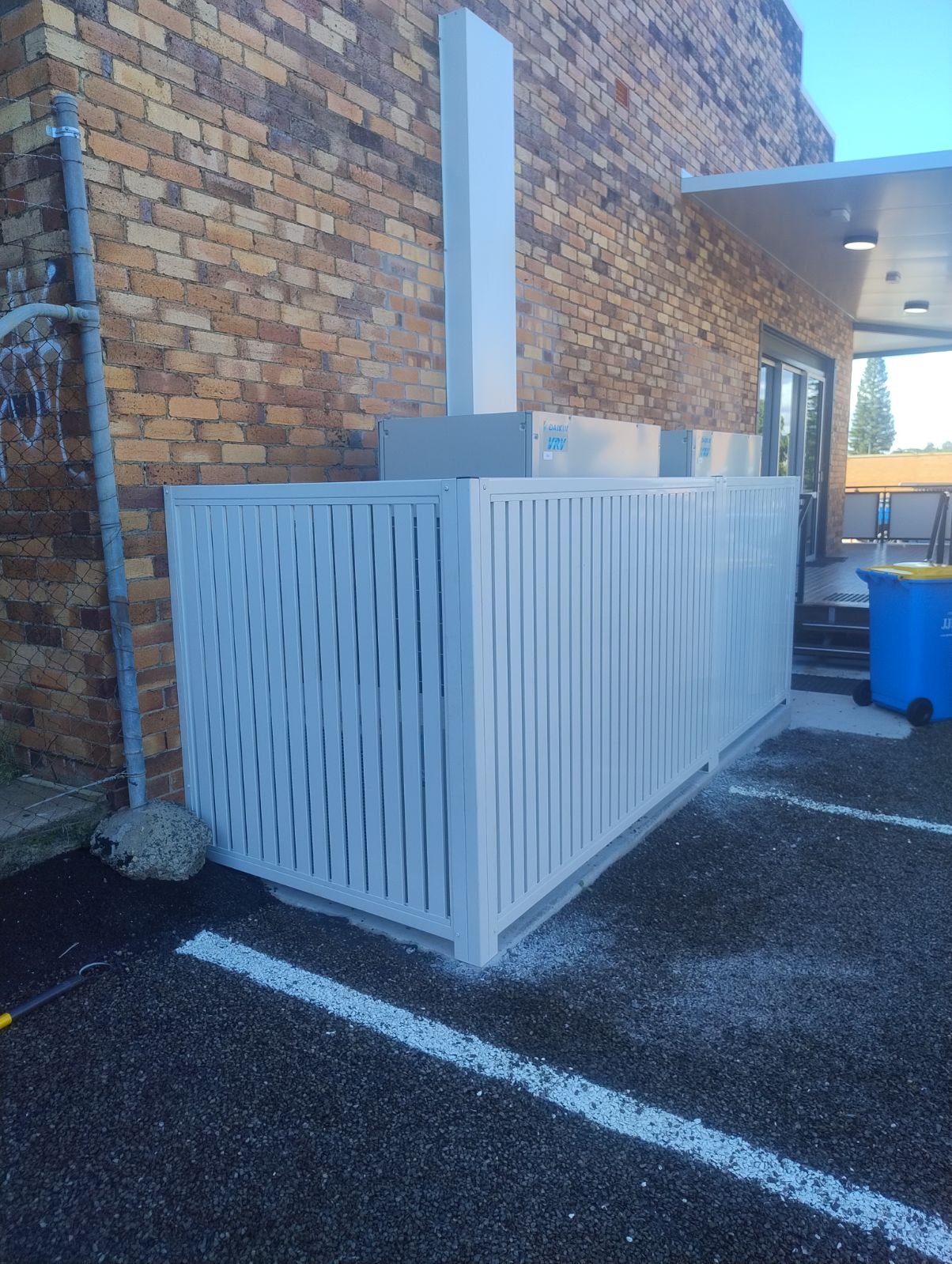after Surfmist Powder-coated Aluminium Custom Door – Aircon Screening, Toowoomba City