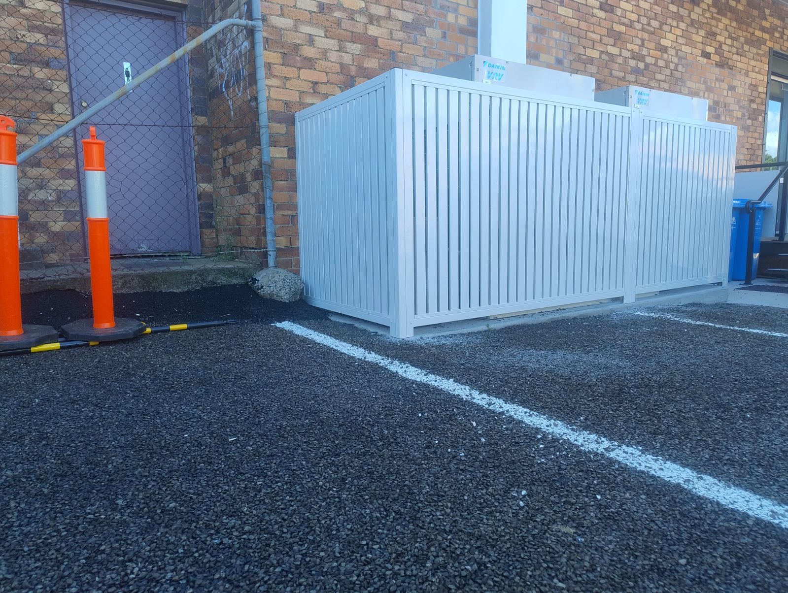 after Surfmist Powder-coated Aluminium Custom Door – Aircon Screening, Toowoomba City