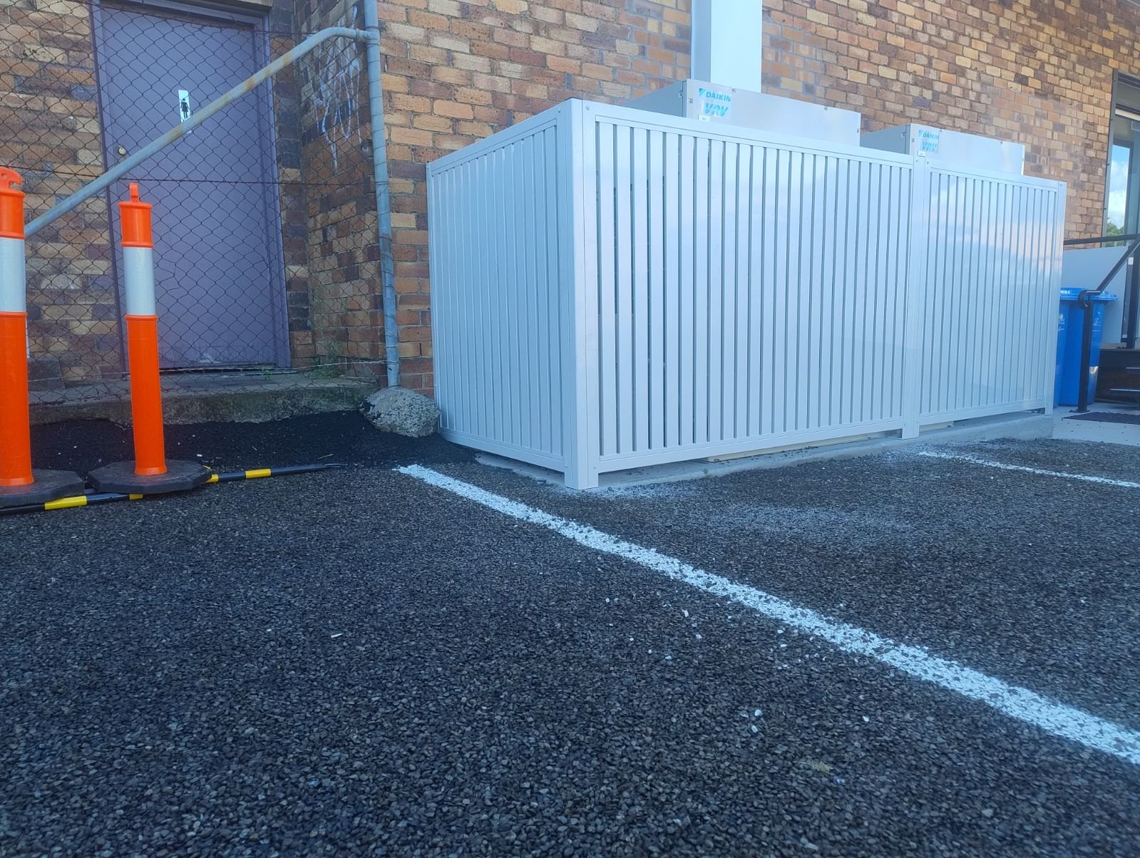 after Surfmist Powder-coated Aluminium Custom Door – Aircon Screening, Toowoomba City