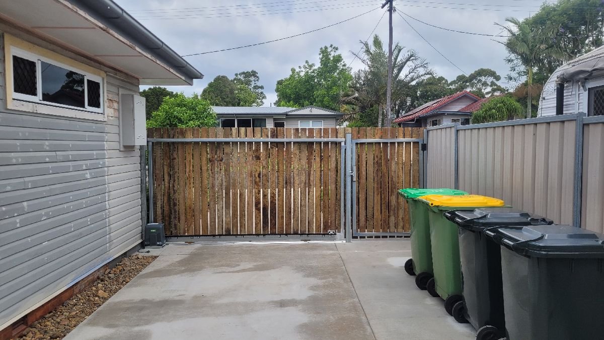 after Wood-look Colorbond + Galvanised Frame Sliding Gate – Steel Gate Frame + Motor, Centenary Heights