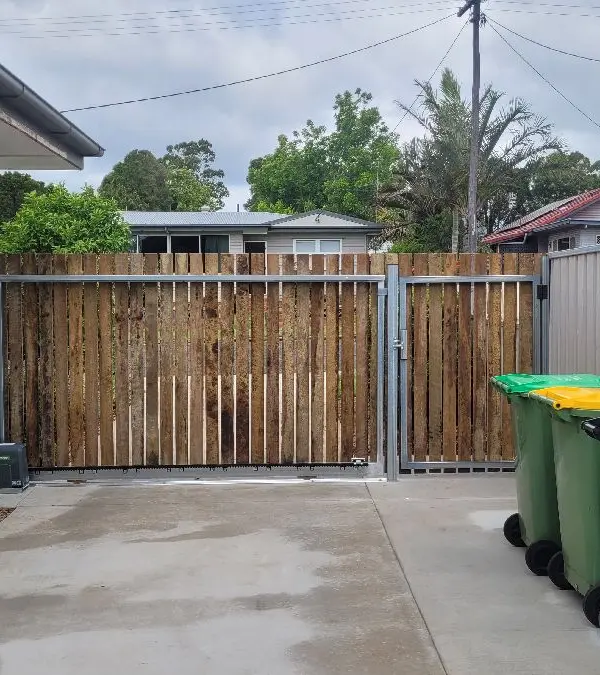 after Wood-look Colorbond + Galvanised Frame Sliding Gate – Steel Gate Frame + Motor, Centenary Heights