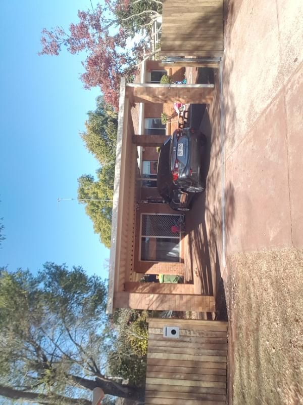 after Wood-look Timber Sliding Gate – GAL GATE/TIMBER PALINGS, Centenary Heights