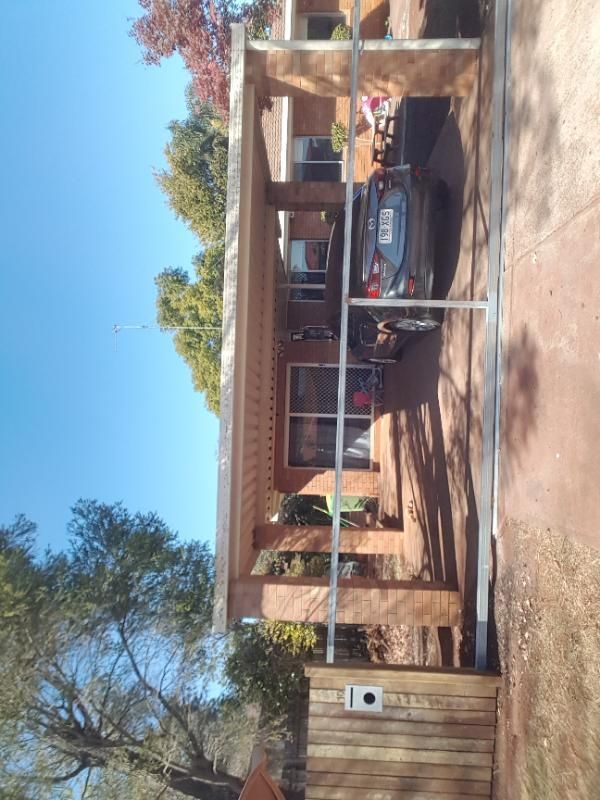 after Wood-look Timber Sliding Gate – GAL GATE/TIMBER PALINGS, Centenary Heights