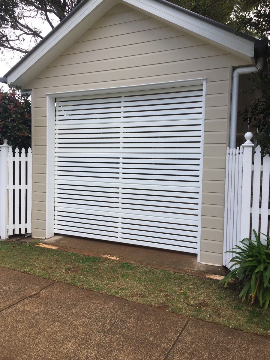 after Pro Texture White Powder-coated Aluminium Custom Door – Slatted Bar Grille, South Toowoomba