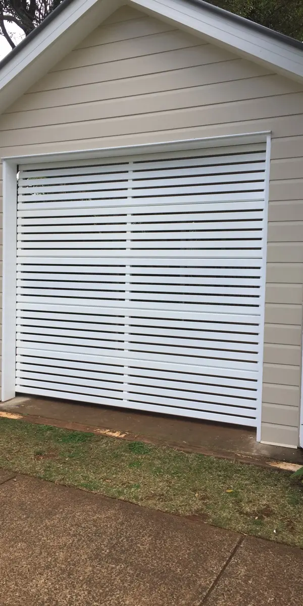 after Pro Texture White Powder-coated Aluminium Custom Door – Slatted Bar Grille, South Toowoomba