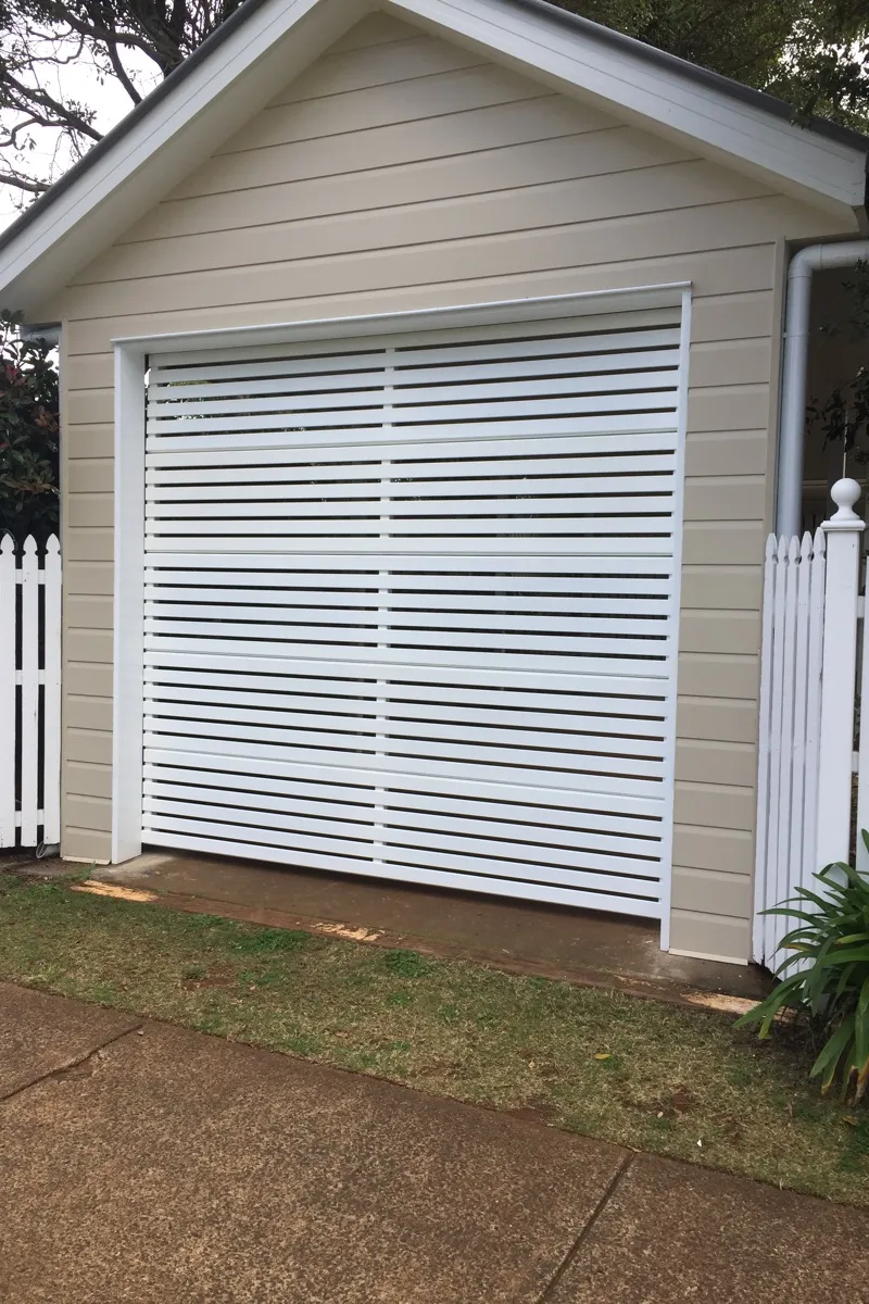 after Pro Texture White Powder-coated Aluminium Custom Door – Slatted Bar Grille, South Toowoomba