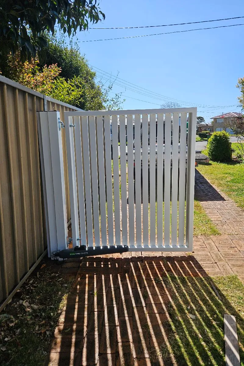 after Pro Texture White Powder-coated Aluminium Swing Gate – Gate + Motor, Harristown