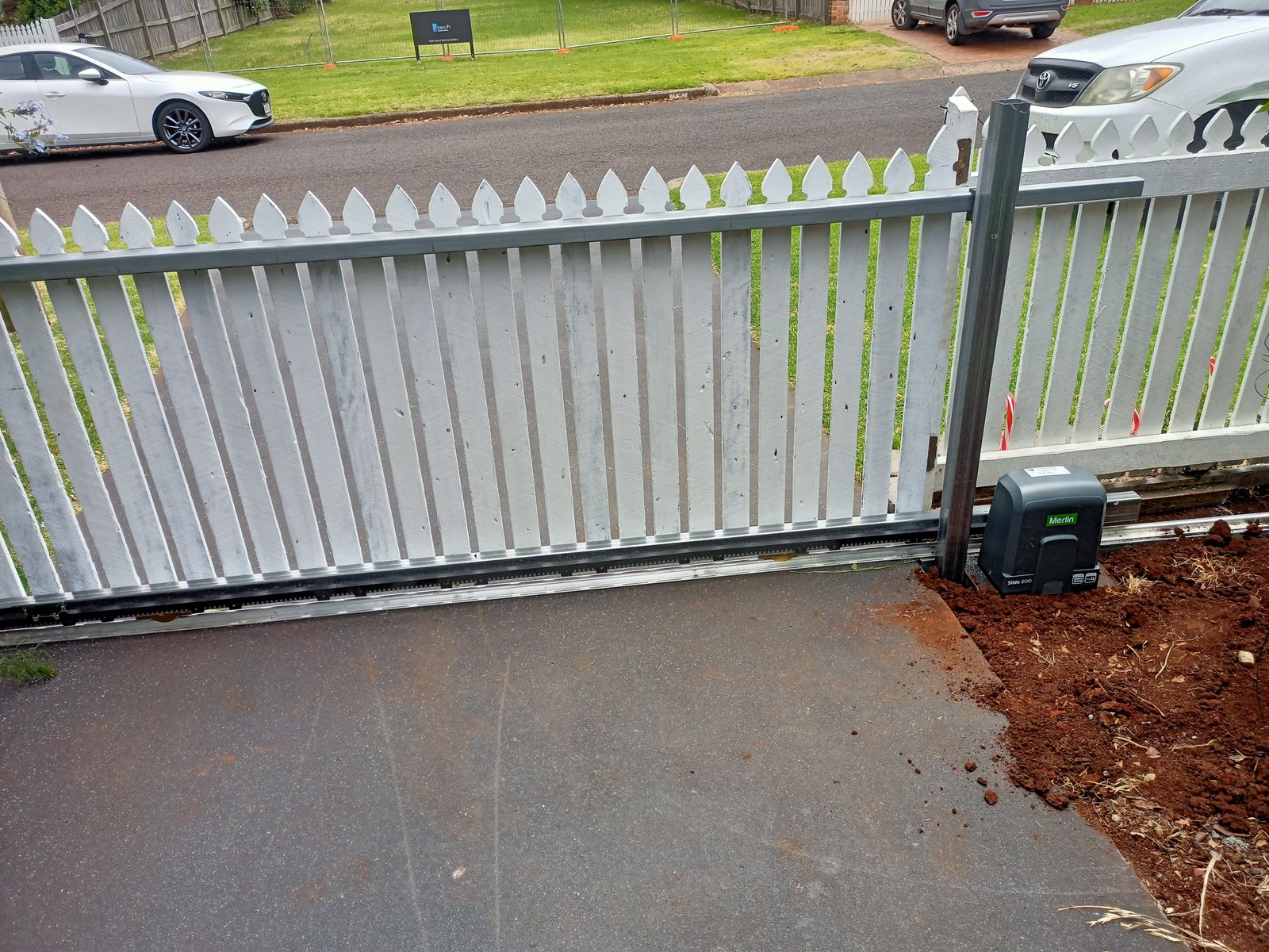 after White Galvanised Steel Frame + White Timber Palings Sliding Gate – GAL FRAME (INC RETURN), East Toowoomba