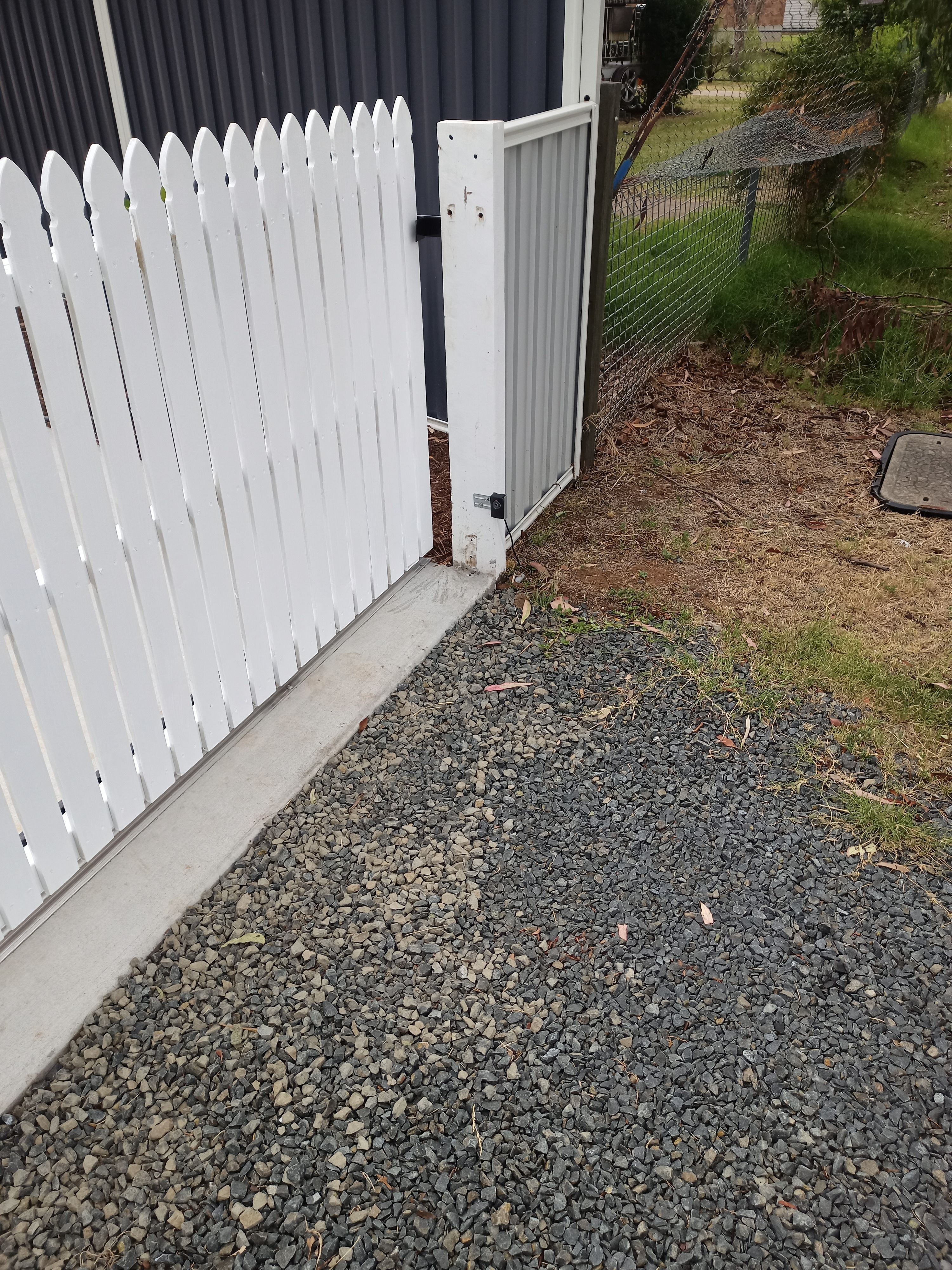 after White Powder-coated Steel + Timber Palings Sliding Gate – Steel Frame, Oakey