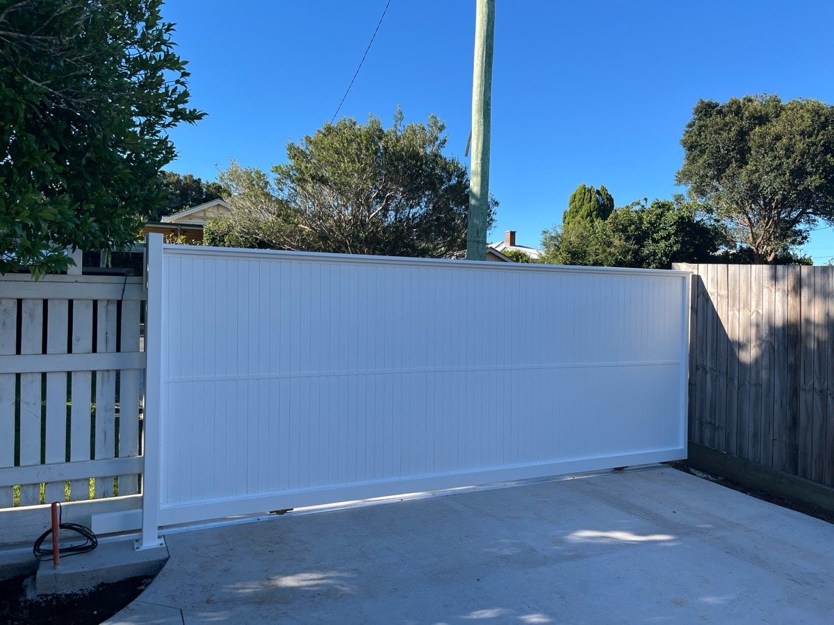 after Powder Coated White Powder-coated Aluminium Sliding Gate – Aluminium Sliding Gates + Motors, East Toowoomba