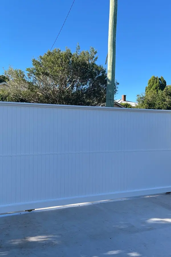 after Powder Coated White Powder-coated Aluminium Sliding Gate – Aluminium Sliding Gates + Motors, East Toowoomba