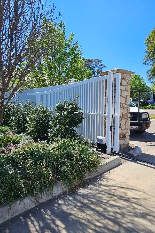 after White Powder-coated Aluminium Sliding Gate – Sliding Gate + Motor, Harristown