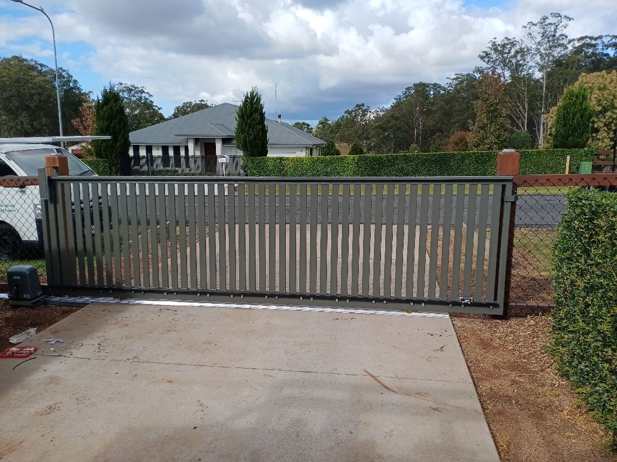 after Woodland Grey Powder-coated Aluminium Sliding Gate – Sliding Gate & PA Gate, Cabarlah