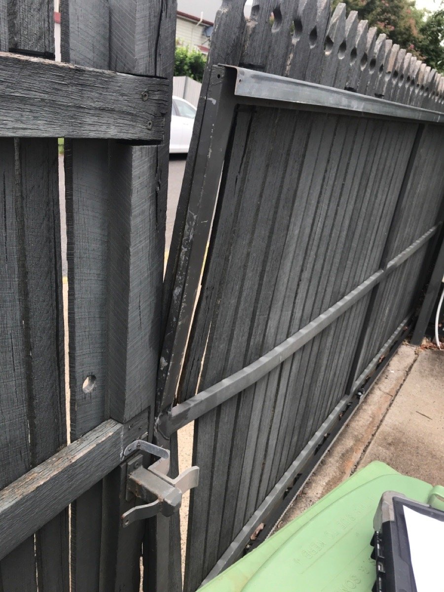 before Woodland Grey Timber Sliding Gate – Timber Gate Repair, East Toowoomba