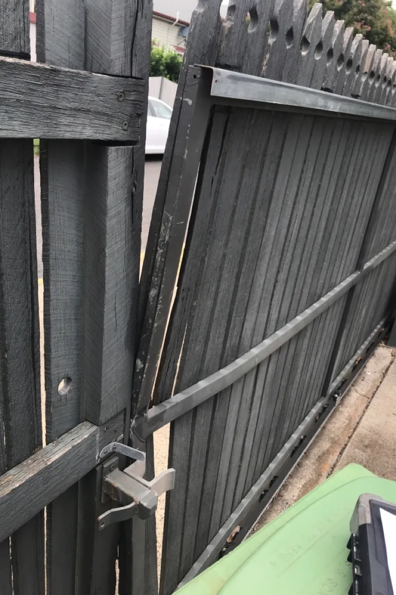 before Woodland Grey Timber Sliding Gate – Timber Gate Repair, East Toowoomba