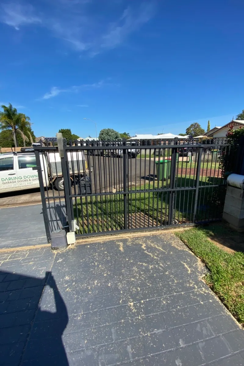 before Black Powder-coated Aluminium Sliding Gate – Gate Repairs, Kearneys Spring
