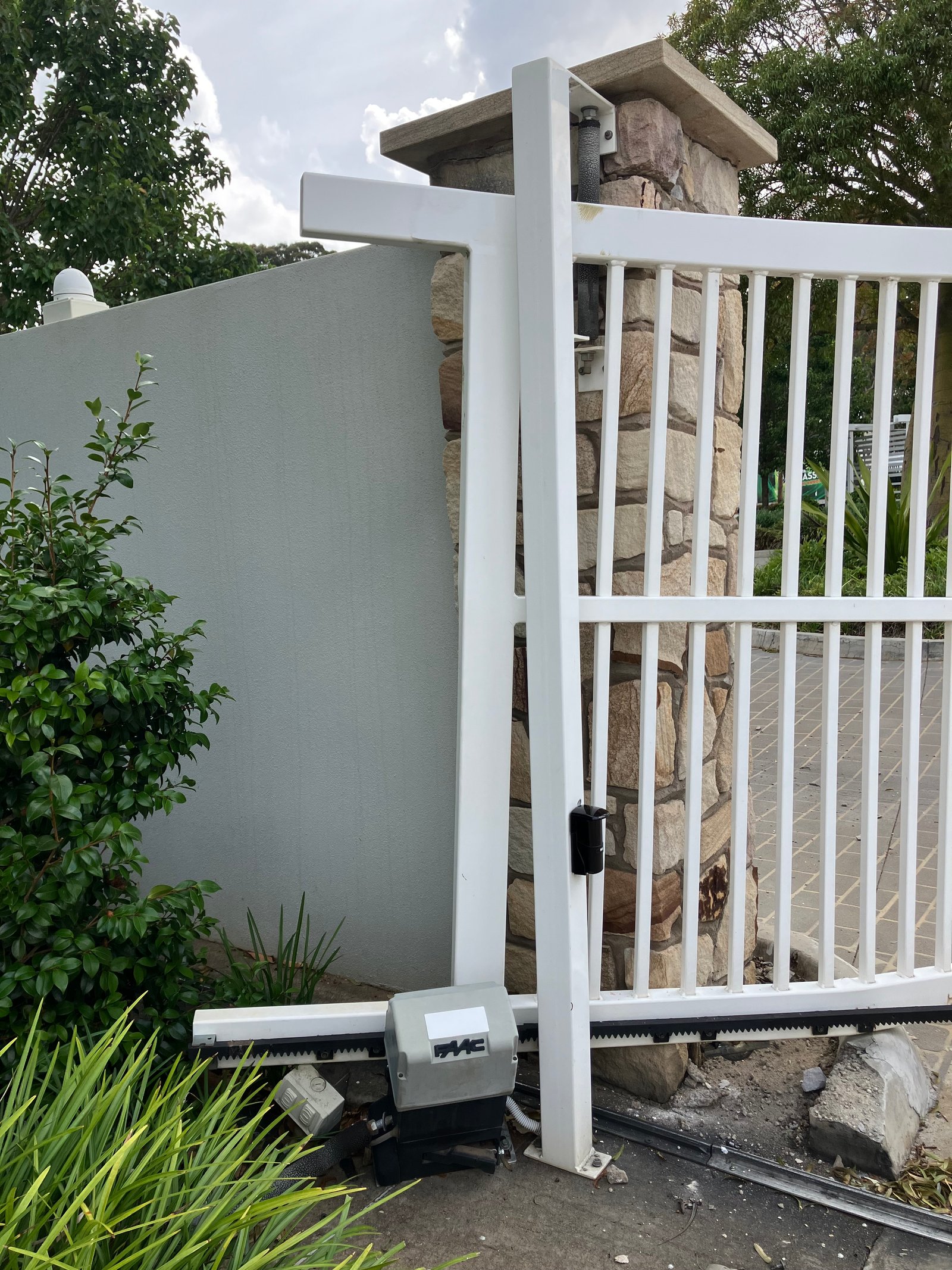 before White Powder-coated Aluminium Sliding Gate – Sliding Gate + Motor, Harristown