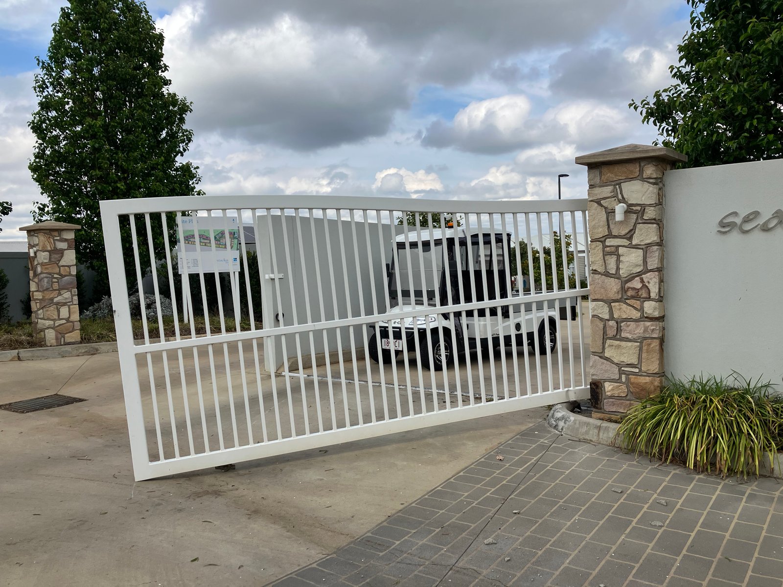 before White Powder-coated Aluminium Sliding Gate – Sliding Gate + Motor, Harristown