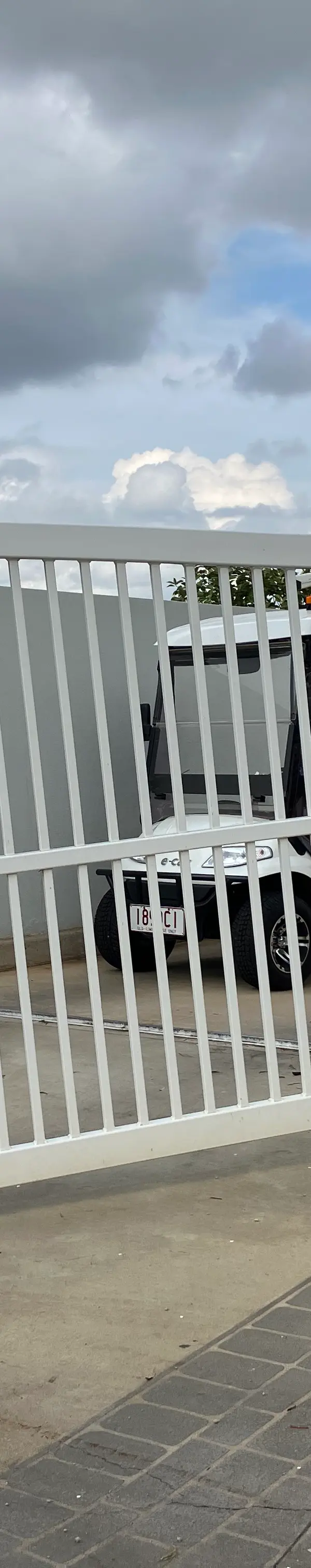 before White Powder-coated Aluminium Sliding Gate – Sliding Gate + Motor, Harristown