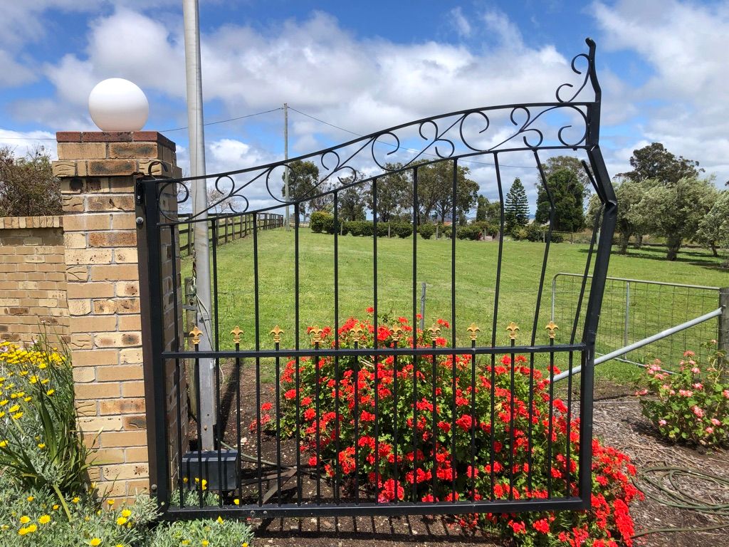 before Black Wrought Iron Swing Gate – Gate Repair, Vale View