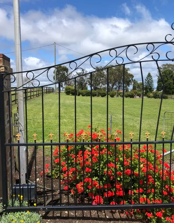 before Black Wrought Iron Swing Gate – Gate Repair, Vale View