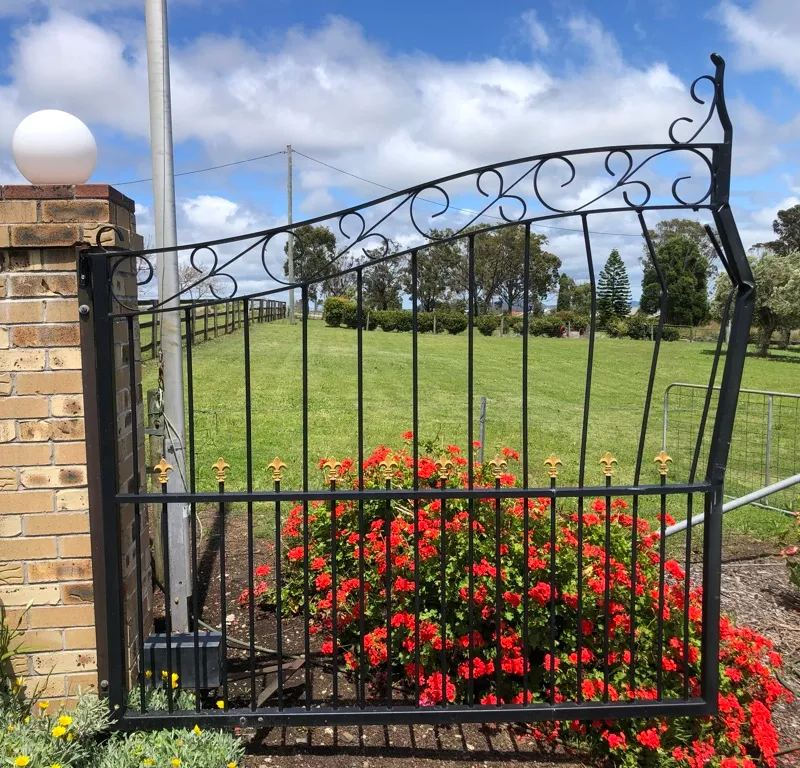 before Black Wrought Iron Swing Gate – Gate Repair, Vale View