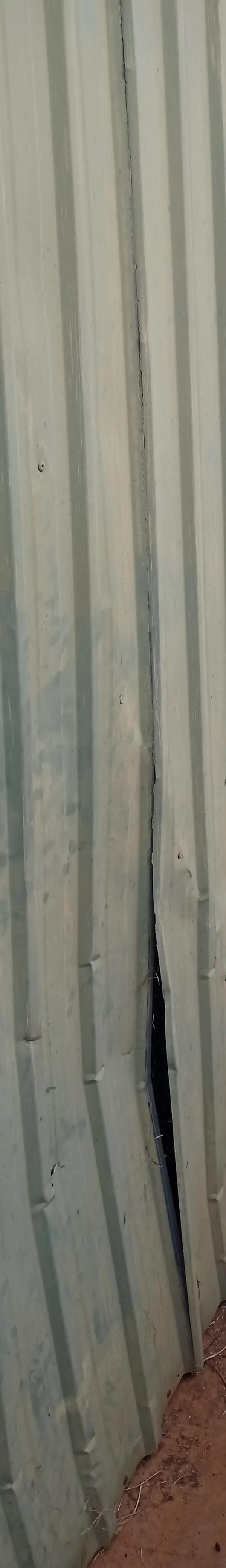 before Galvanised Galvanised Steel Tilt Door – Tilt Door Damage, Wilsonton