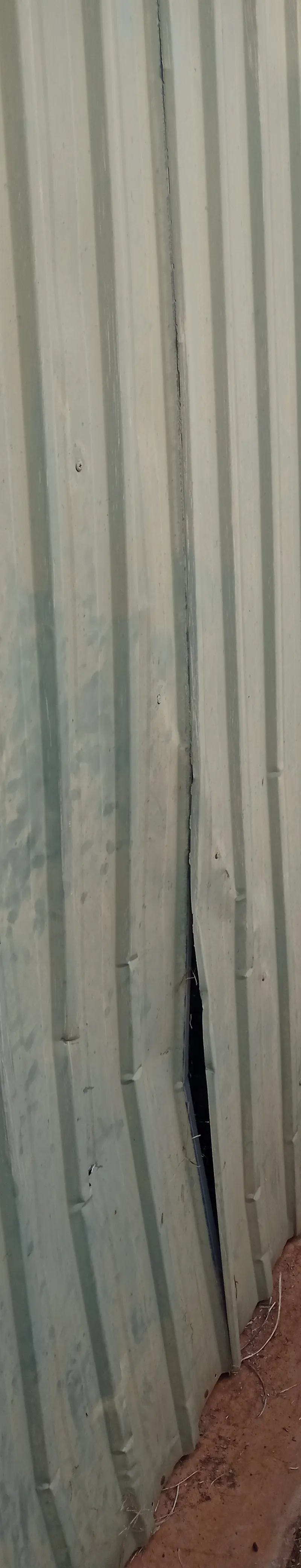 before Galvanised Galvanised Steel Tilt Door – Tilt Door Damage, Wilsonton