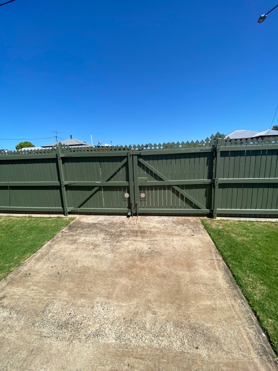 before Wood-look Timber Sliding Gate – Slide Gate + Motor, Harristown