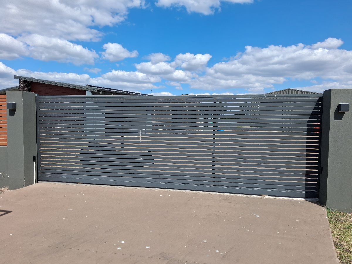 before Basalt Powder-coated Aluminium Sliding Gate – New Gate, Torrington
