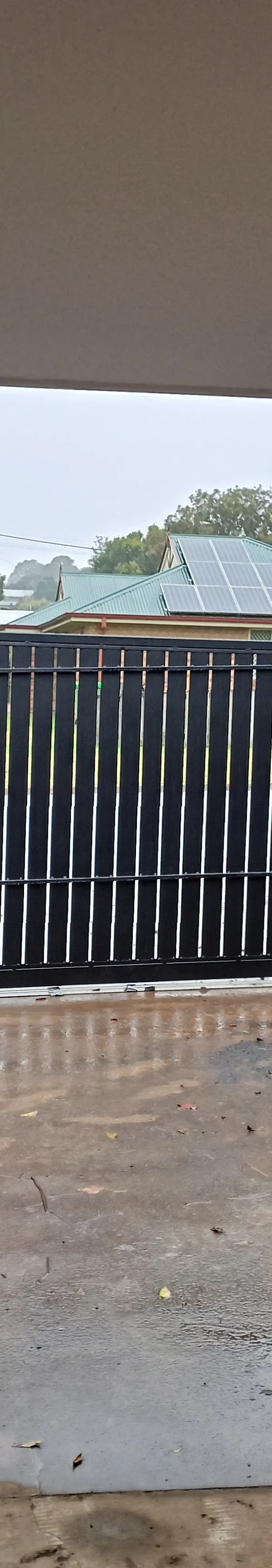 before Black Powder-coated Aluminium Sliding Gate – Aluminium Sliding Gate + Motor, South Toowoomba