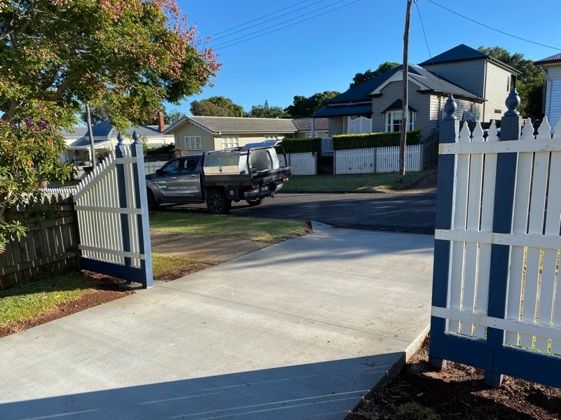 before Mixed Galvanised + Timber Picket Sliding Gate – Steel Frame + Motor, North Toowoomba