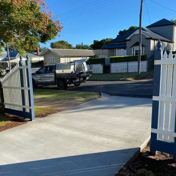 before Mixed Galvanised + Timber Picket Sliding Gate – Steel Frame + Motor, North Toowoomba