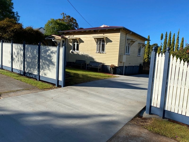 before Mixed Galvanised + Timber Picket Sliding Gate – Steel Frame + Motor, North Toowoomba