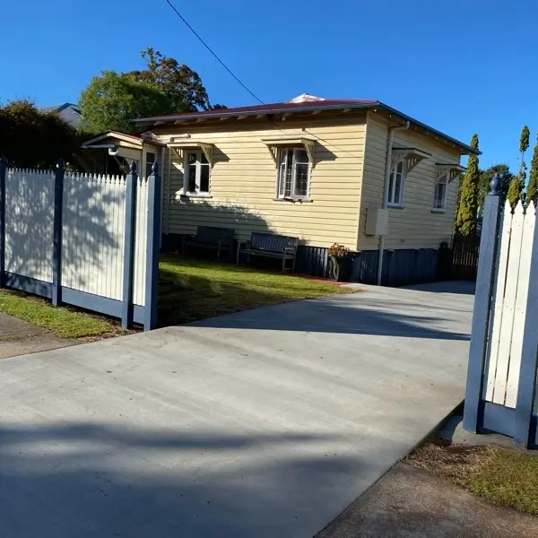 before Mixed Galvanised + Timber Picket Sliding Gate – Steel Frame + Motor, North Toowoomba