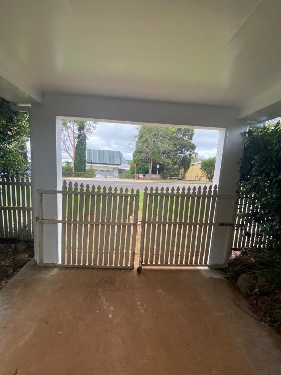 before White Aluminium Custom Door – Slatted Bar Grille, South Toowoomba