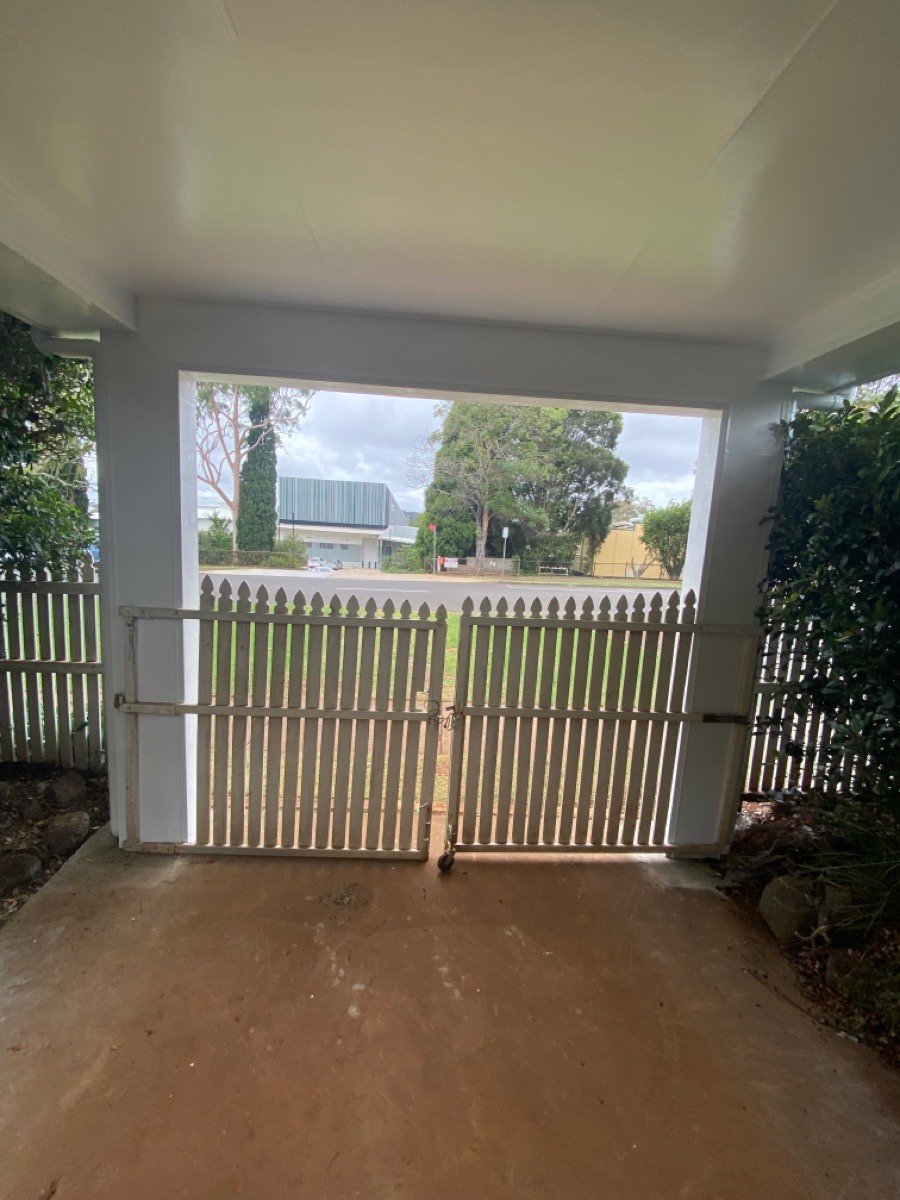 before White Aluminium Custom Door – Slatted Bar Grille, South Toowoomba