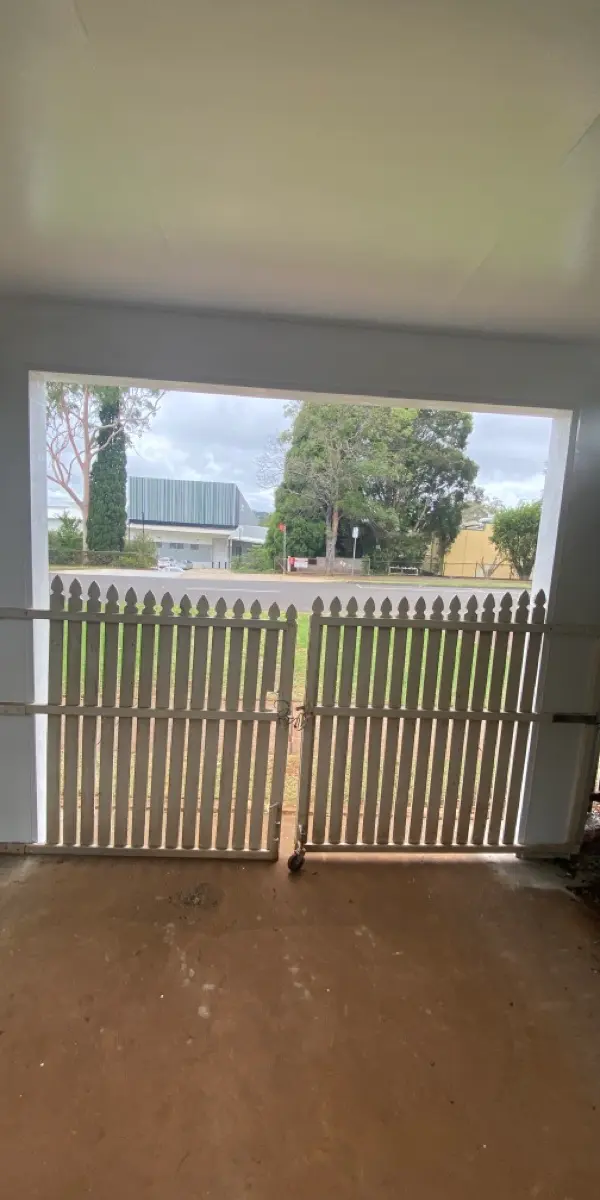 before White Aluminium Custom Door – Slatted Bar Grille, South Toowoomba