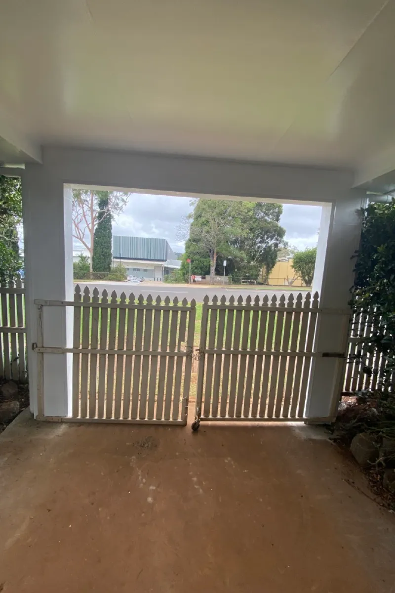 before White Aluminium Custom Door – Slatted Bar Grille, South Toowoomba