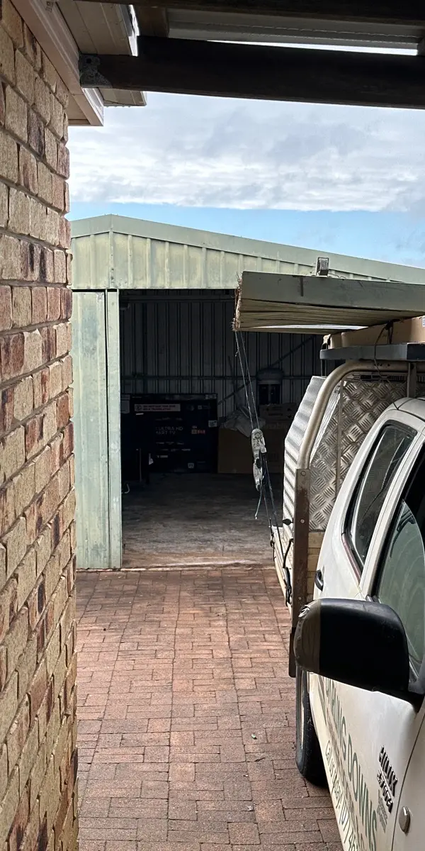 before Galvanised Galvanised Steel Tilt Door – Tilt Door Damage, Wilsonton
