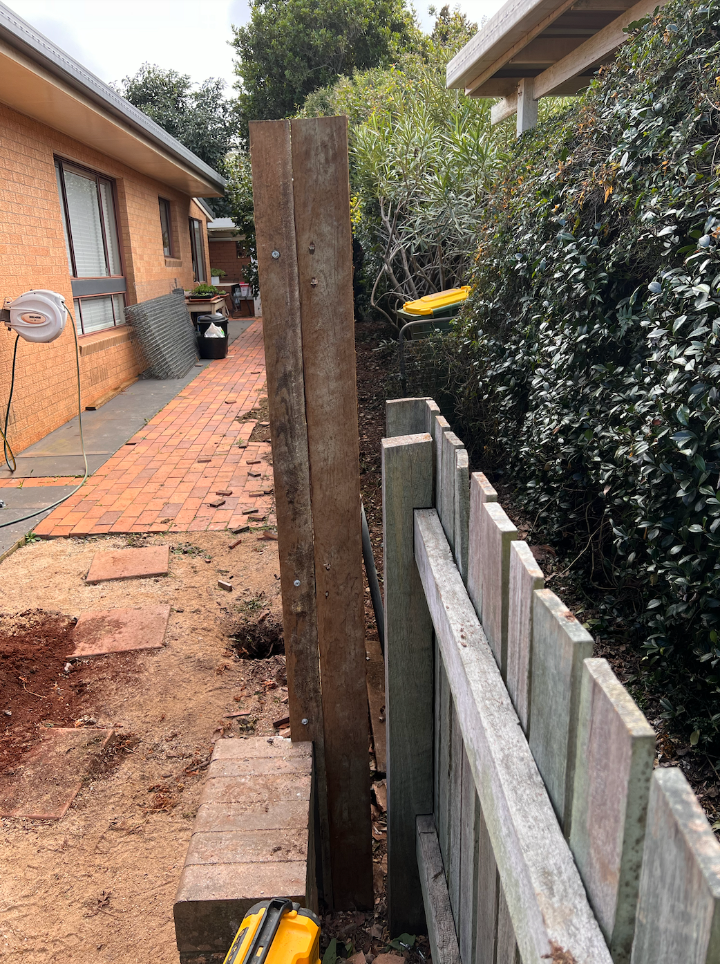 in progress Wood-look Timber + Galvanised Steel Posts Custom Door – Side Fencing, Rangeville